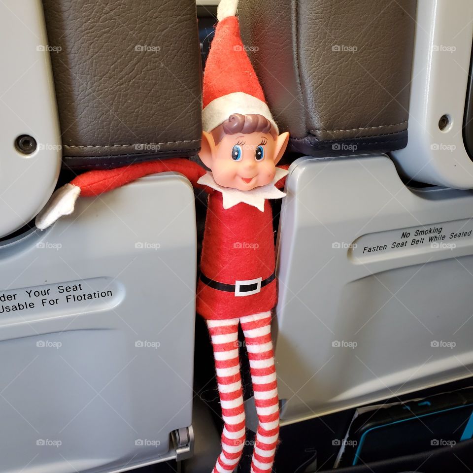 Elf hanging around on plane
