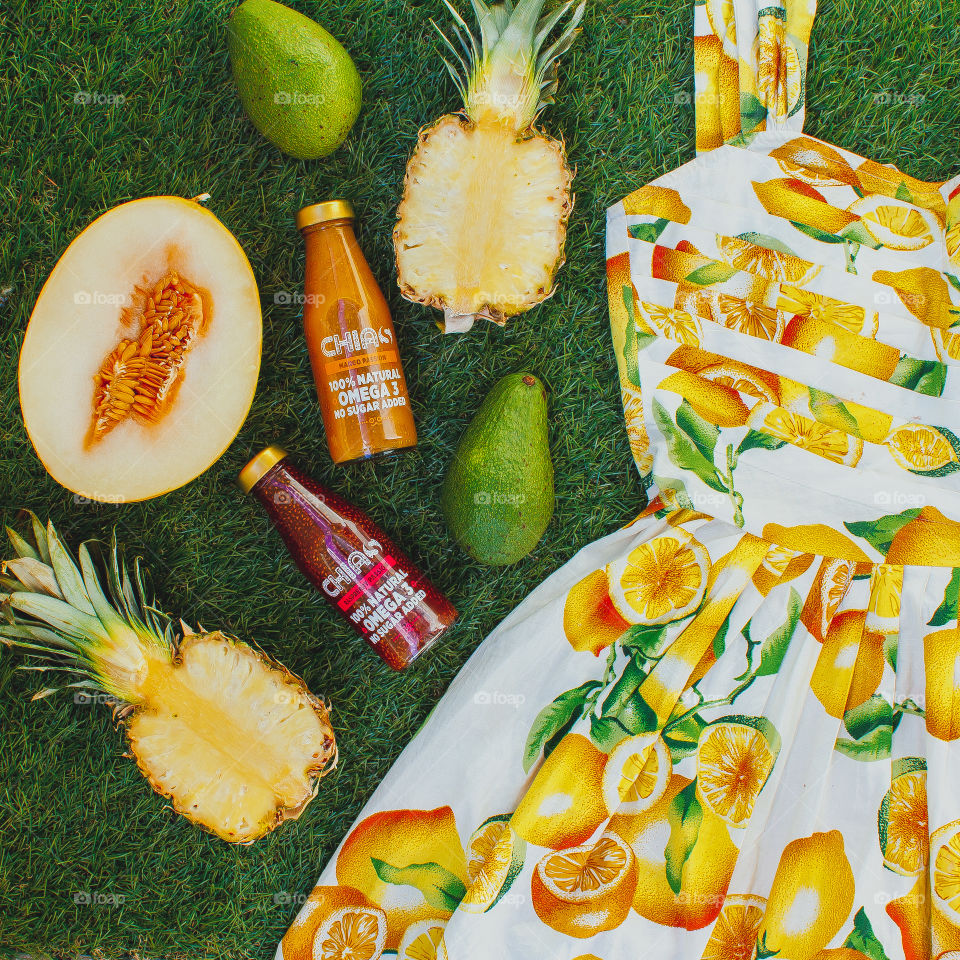 Dress and fruits on the grass