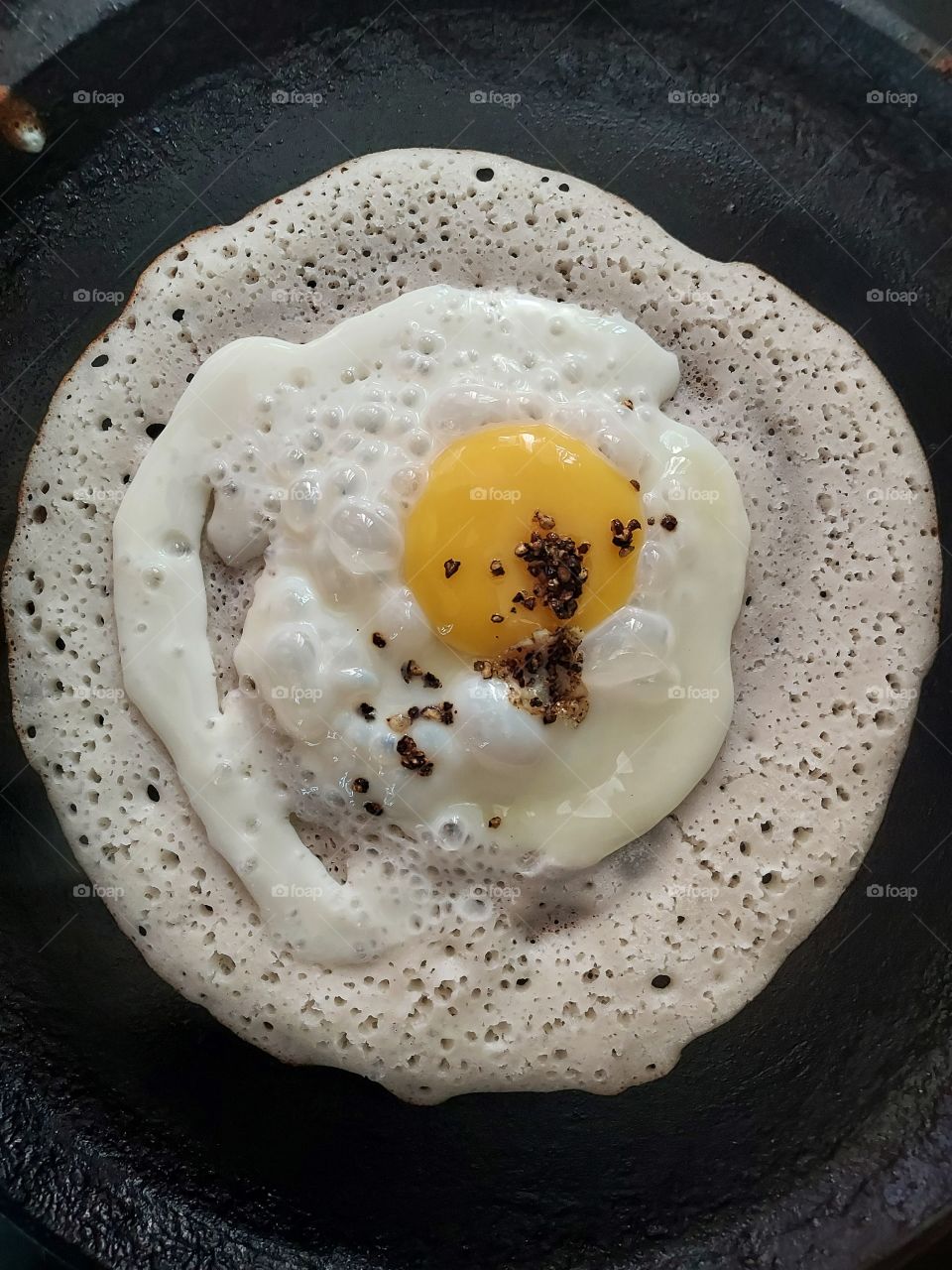 sunny side up with an Indian pancake