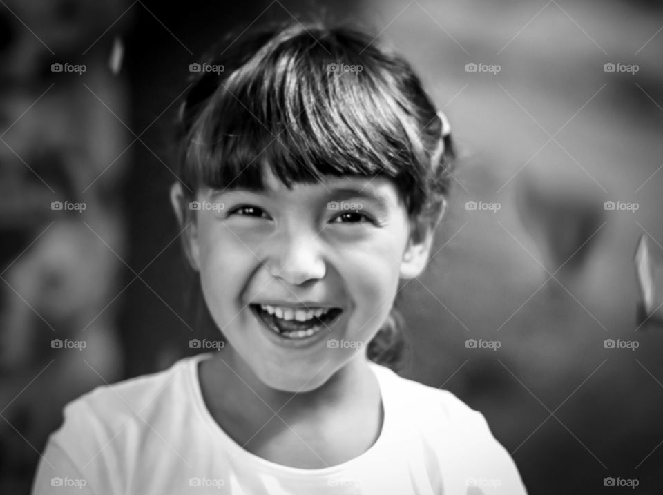 Portrait of a happy smiling little girl