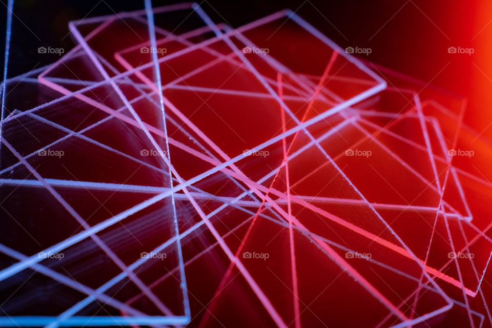 blue and red lines on a dark background