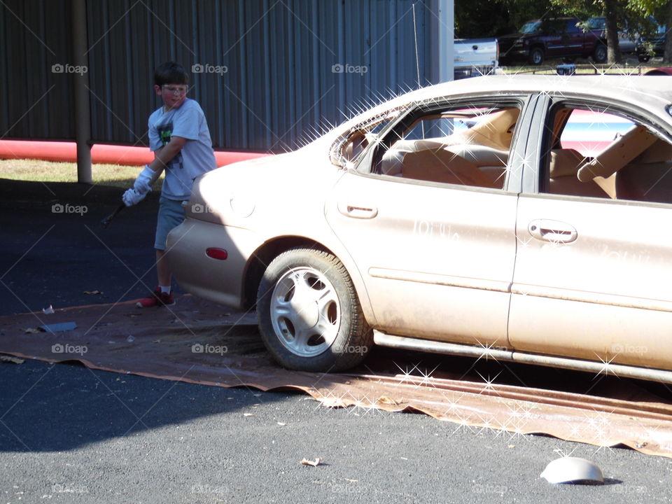 harder. This was a beat up car 🚗 that was used for a punching bag