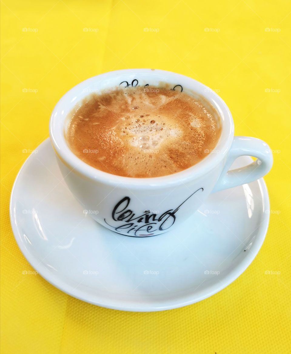 Coffee table served eat tasty view day outdoor outside street capture cafe restaurant