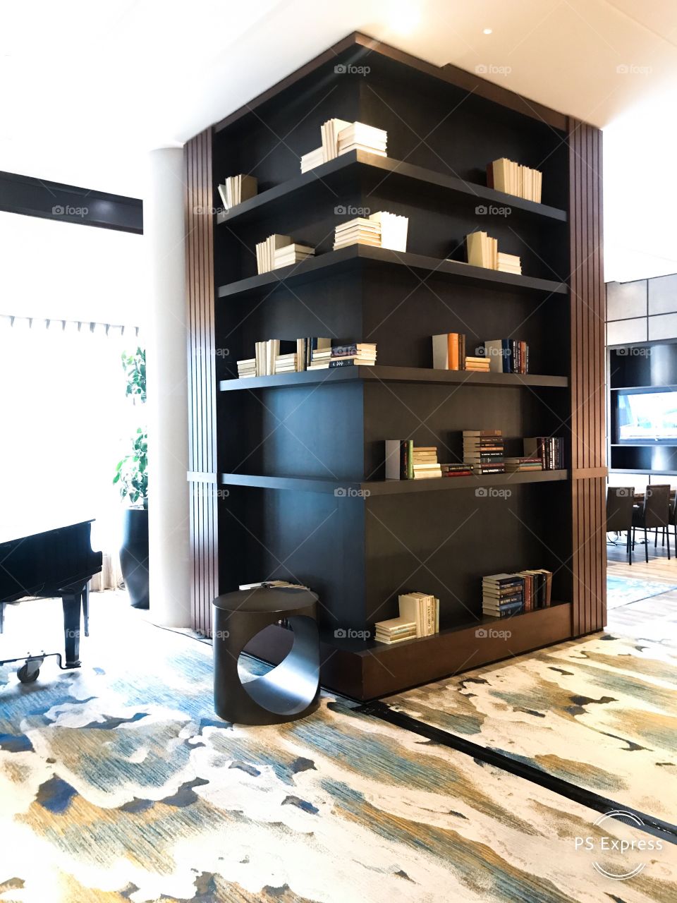 Hotel decor book shelf lobby architecture