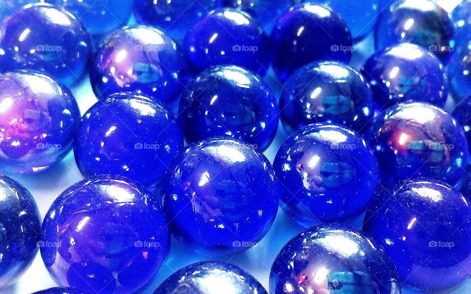Blue round marbles