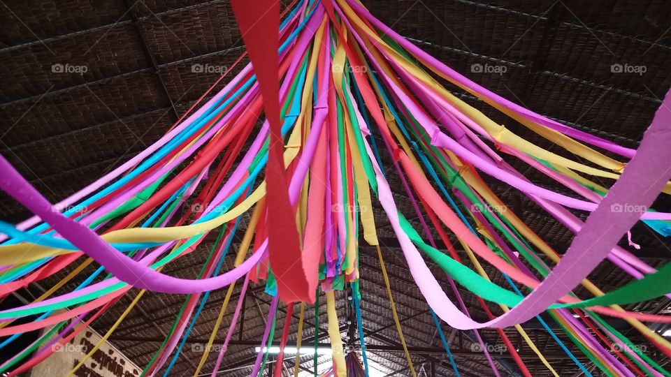 Colorful fabrics tie on the beams