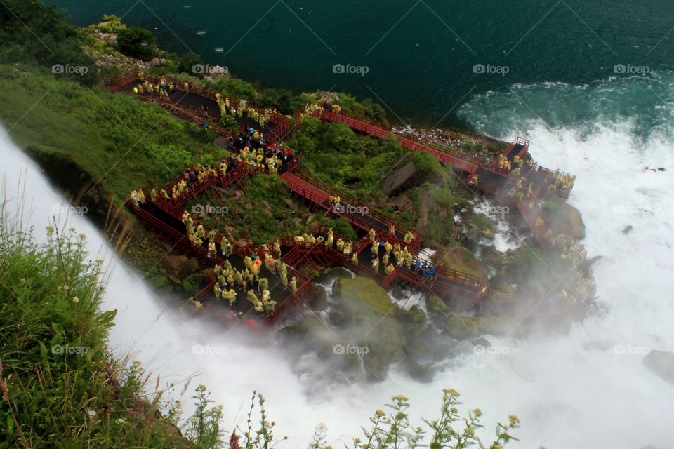 Cave of the Winds Tourists. People wearing rain coats touring cave of winds...fyi no point to wear a raincoat