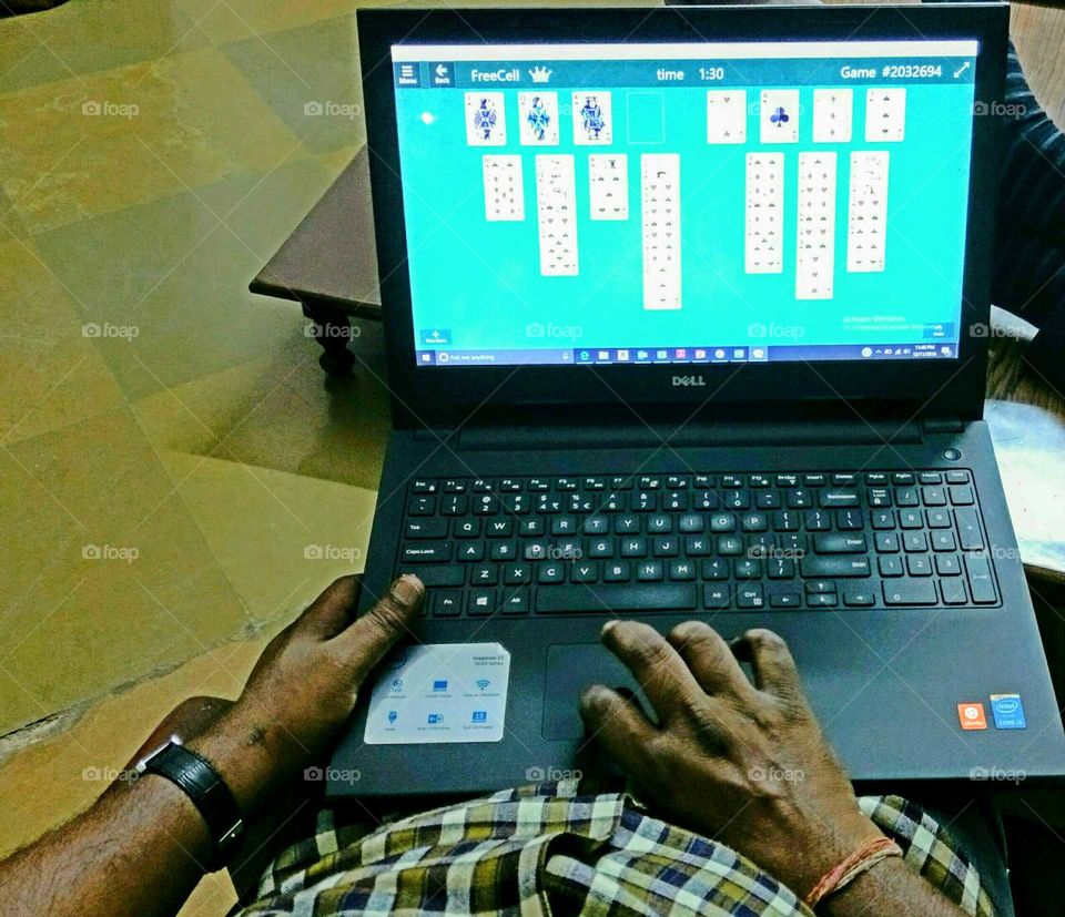 Relaxing, playing Free cell