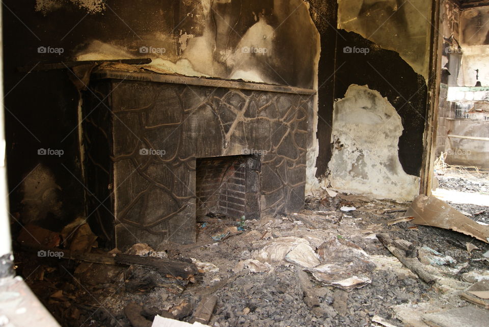 Fireplace inside a burned out house