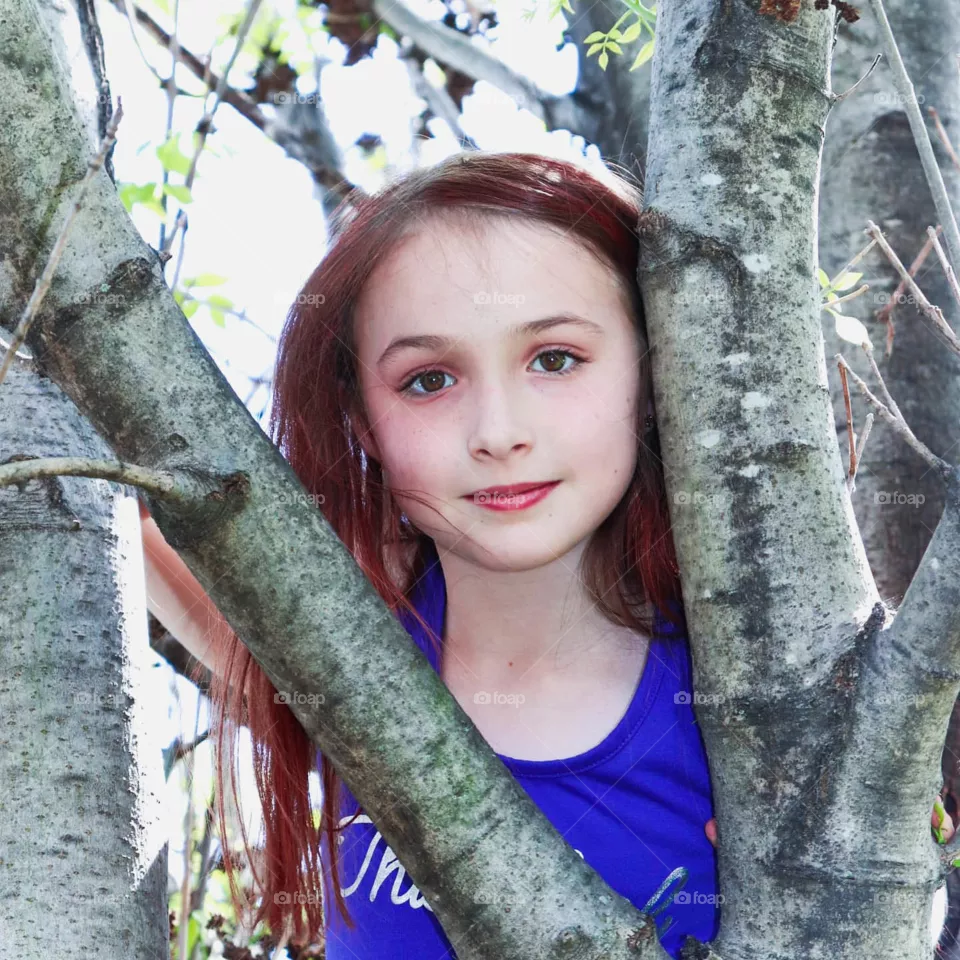 girl in a tree