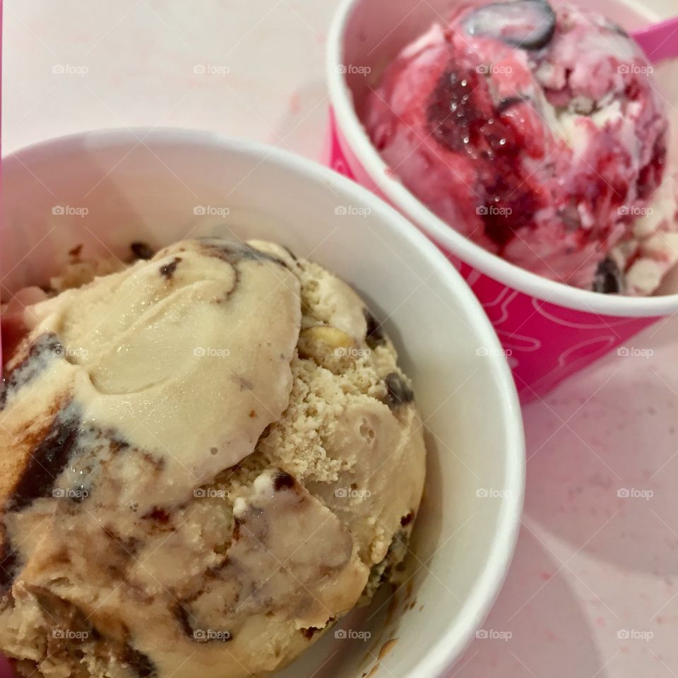 Two cups of delicious ice cream. Baskin Robbins’ Jamocha Almond Fudge and Love Potion 31.