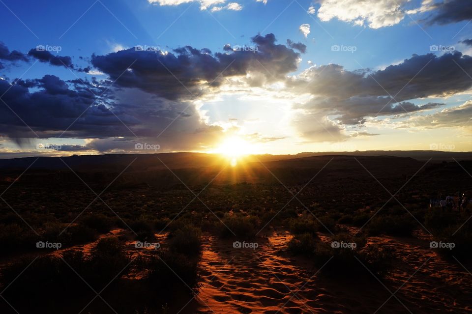 sunset with rays of light in the sky