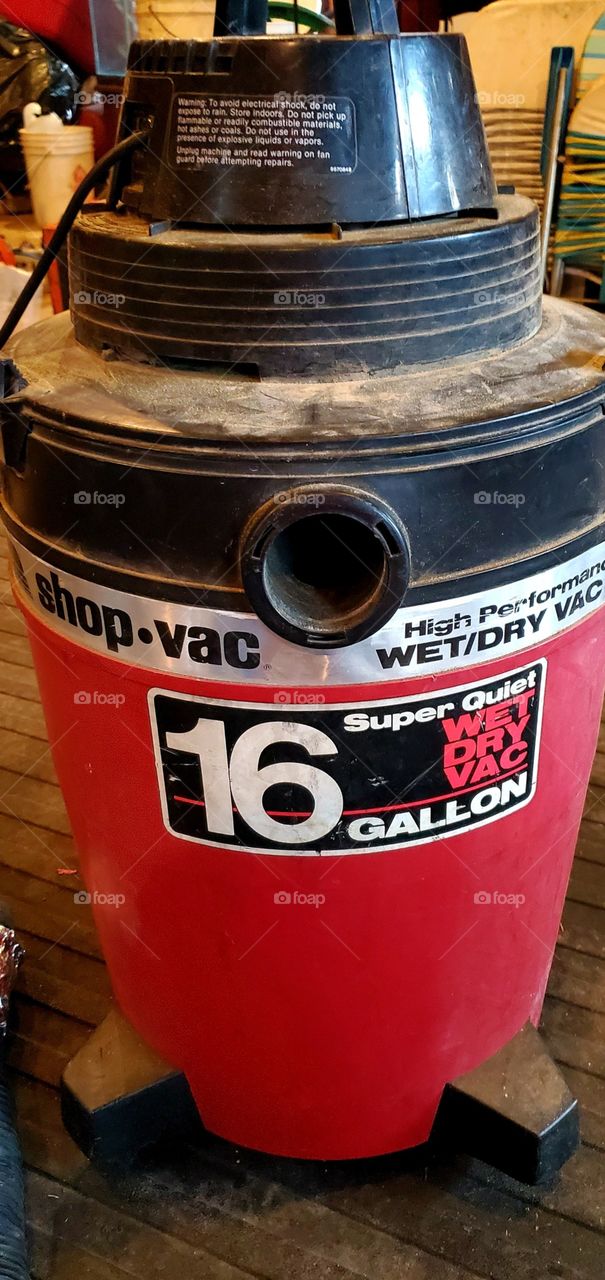 Old Red Wet/Dry Shop Vac, used to vacuum up wet and dry spills & dirt from home cellars. Also used for business spills & dirt.