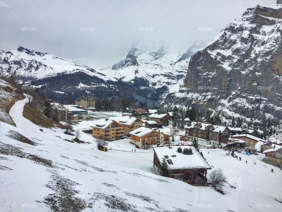 Houses covered by the snow during winter