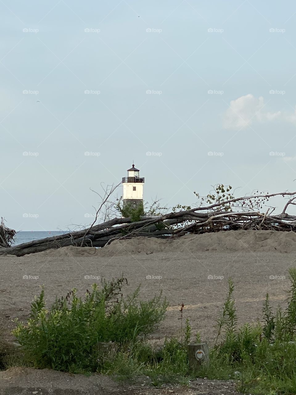 Life is short travel light house beach Great Lakes 