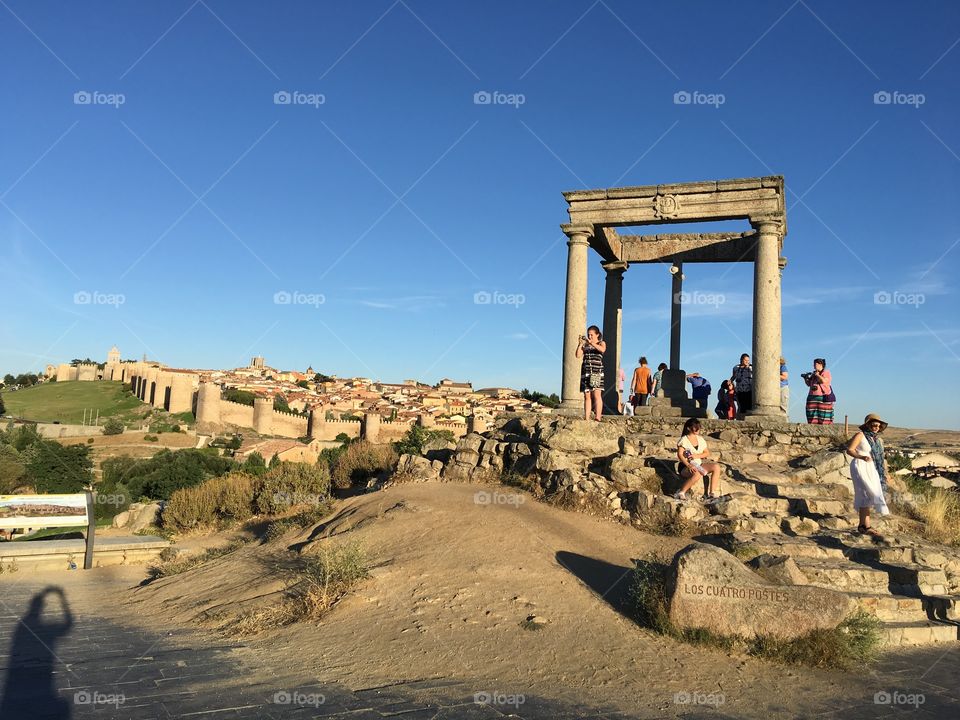 Tourists taking photos Avila Spain 