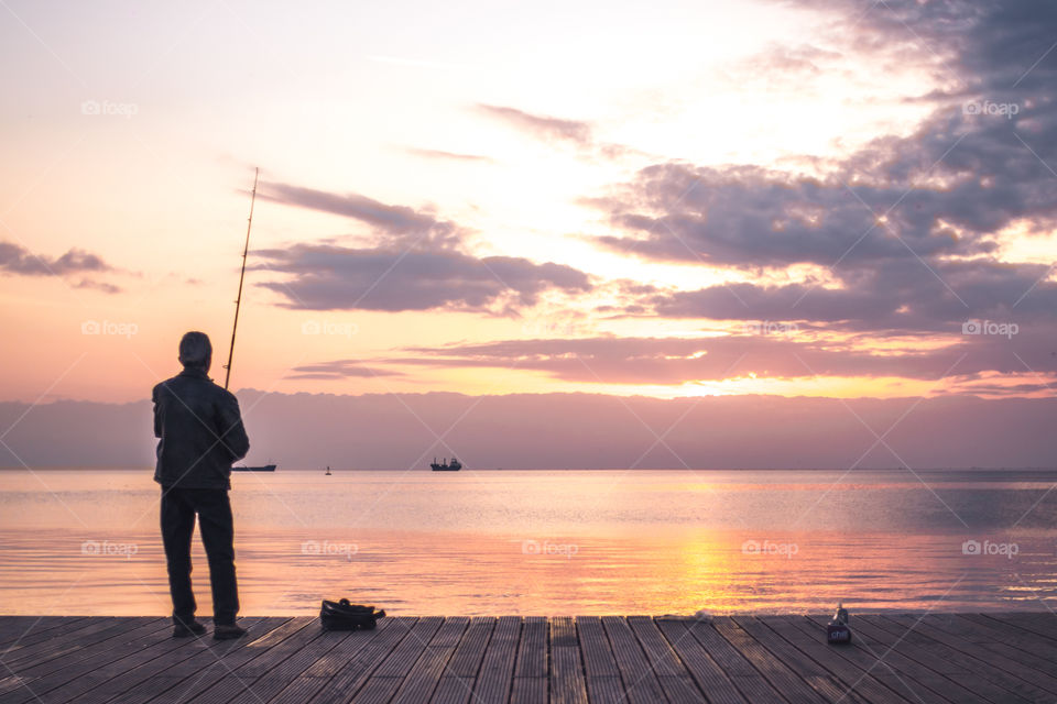 Fisherman In The Sunset
