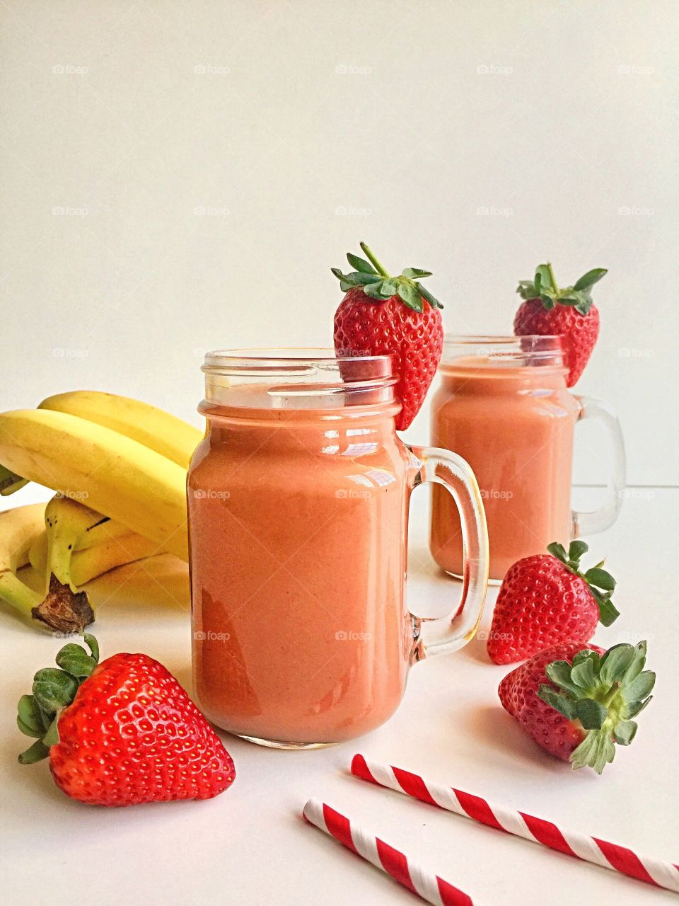 Fresh strawberry smoothie in mason jar