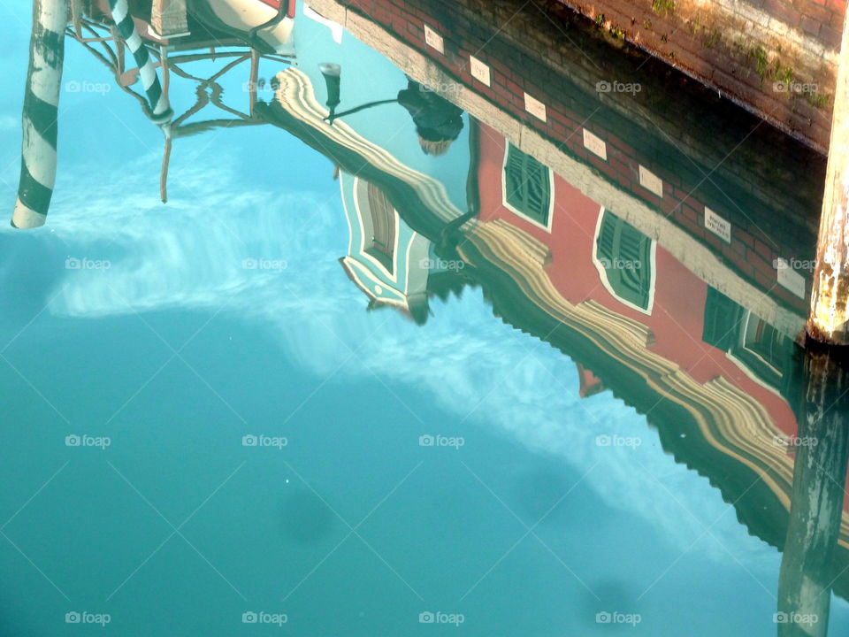 reflection in canal in Burano