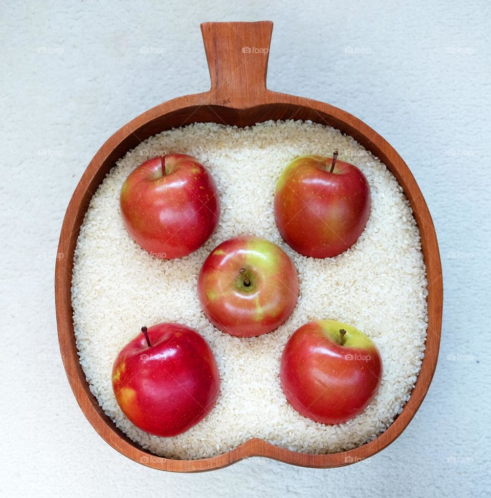 Apples in an apple shaped container