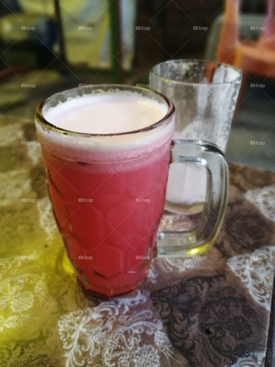 Healthy and energetic mix fruit juice on table. My favorite and energetic food or drink mix with pineapple, orange, sweet lemon,lemon, with strawberry flavours.