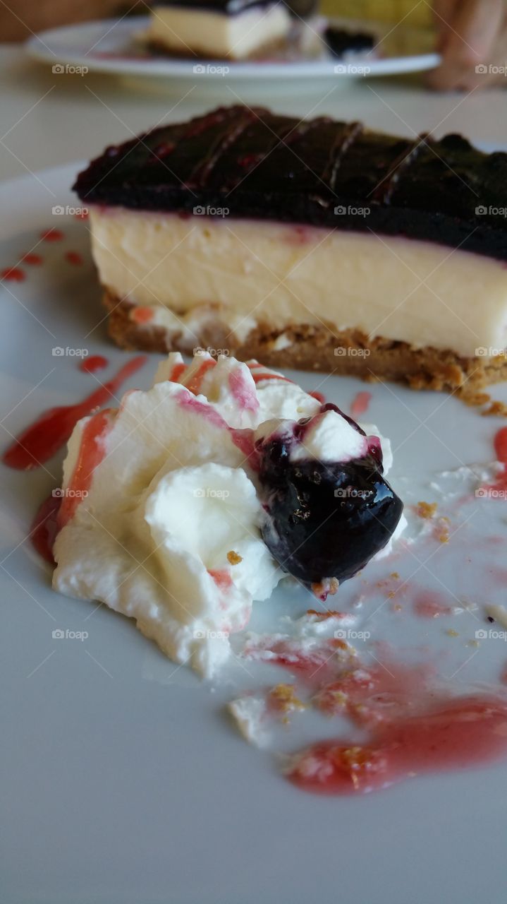 A Delicious Cheesecake with a cherry