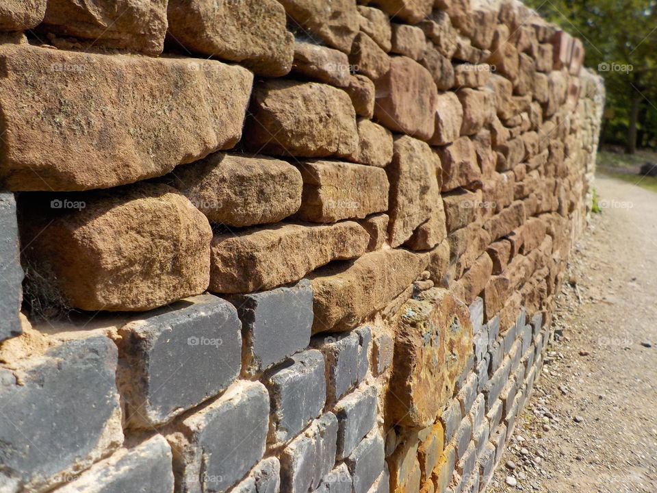 Follow the brick wall 