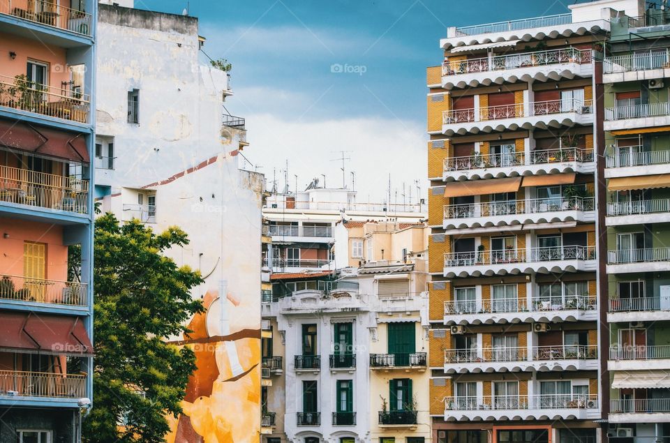 Colorful houses on Dimitriou Gounari street. The street is an ancient city, pedestrian area with cozy cafes and shops,  Thessaloniki, Greece