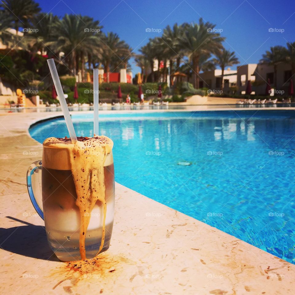 Fresh iced coffee at poolside