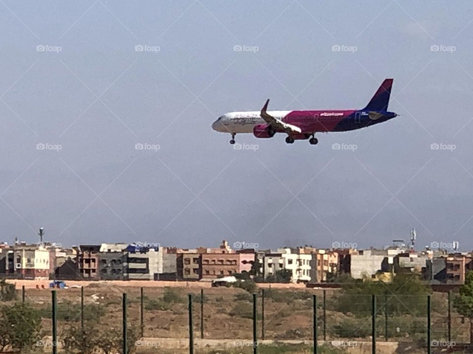 beautiful aircraft flying cross the blue sky