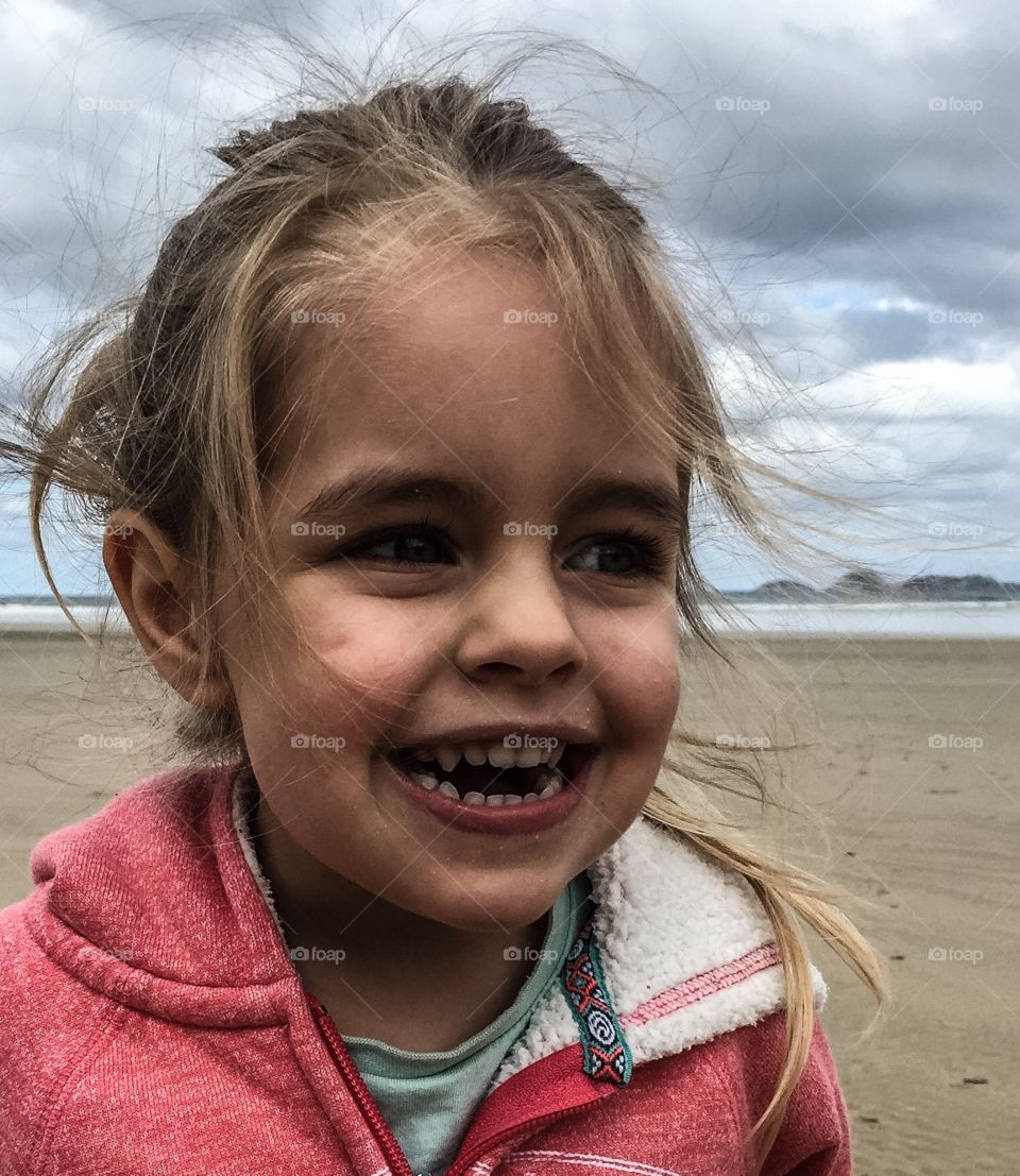 Close-up of a cute girl at beach