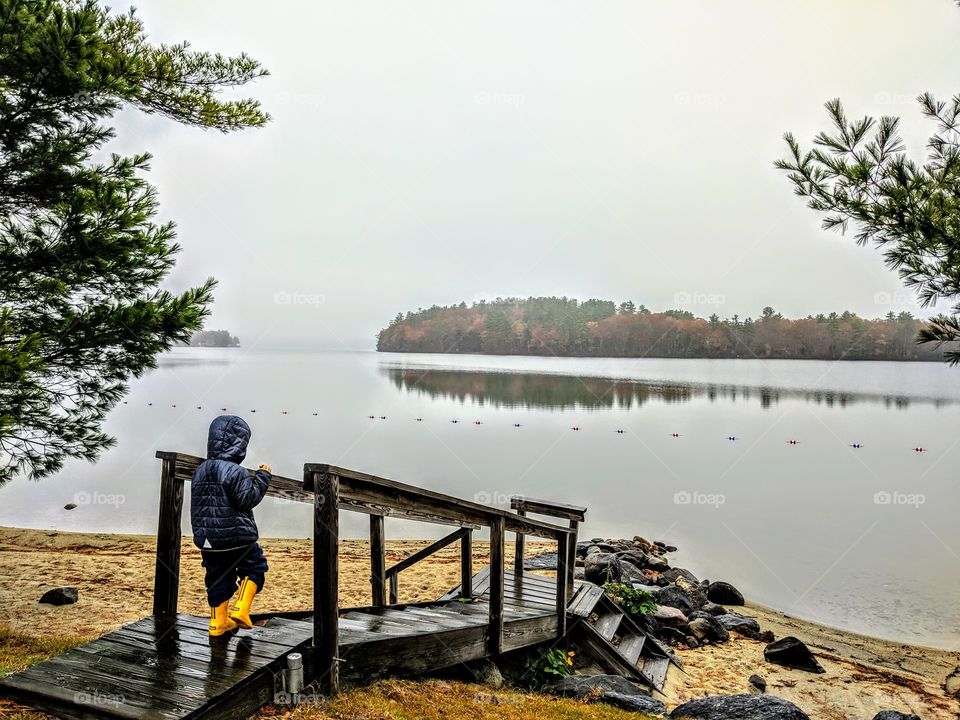 boy out for a walk at the beach