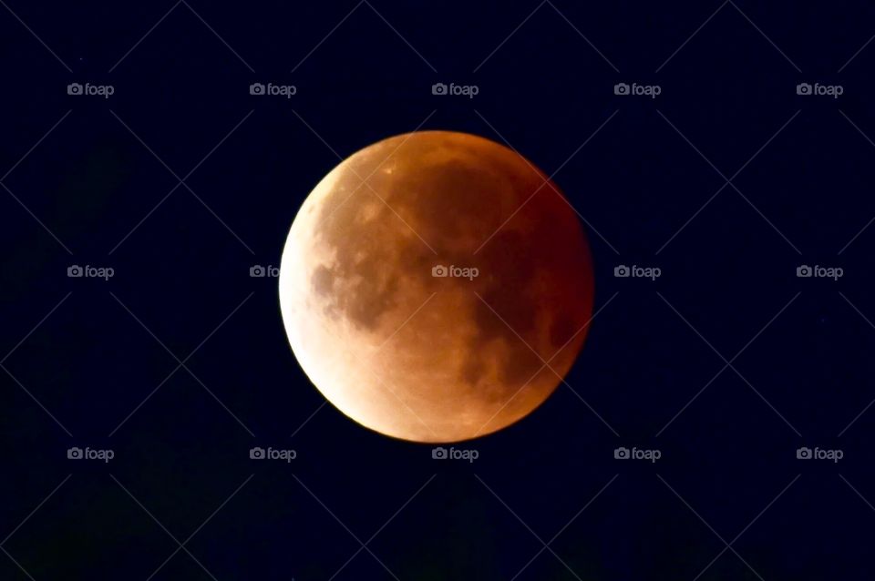 Super red blood moon after solar eclipse