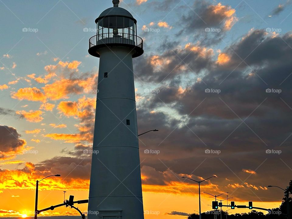 Sunset Tower. A lighthouse is a tower that stands on the seashore. Its main purpose is ship navigation. It would seem that the lighthouse was literally created in order to be somewhere alone being the tallest building so that it can be seen from afar