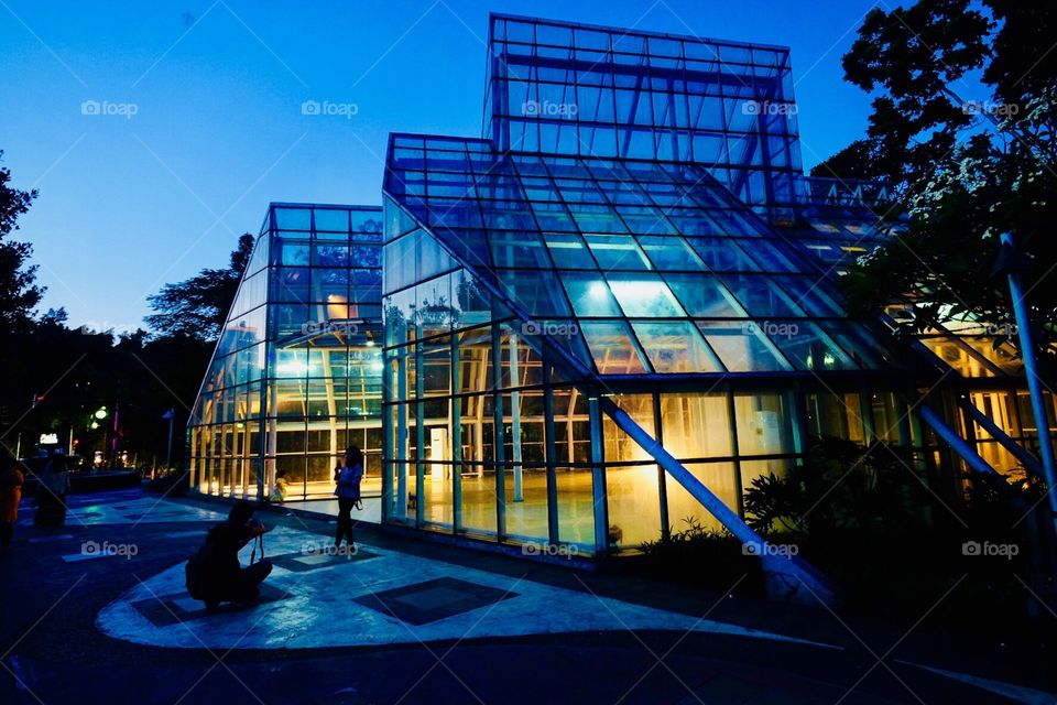 Glass house in blue hour.
