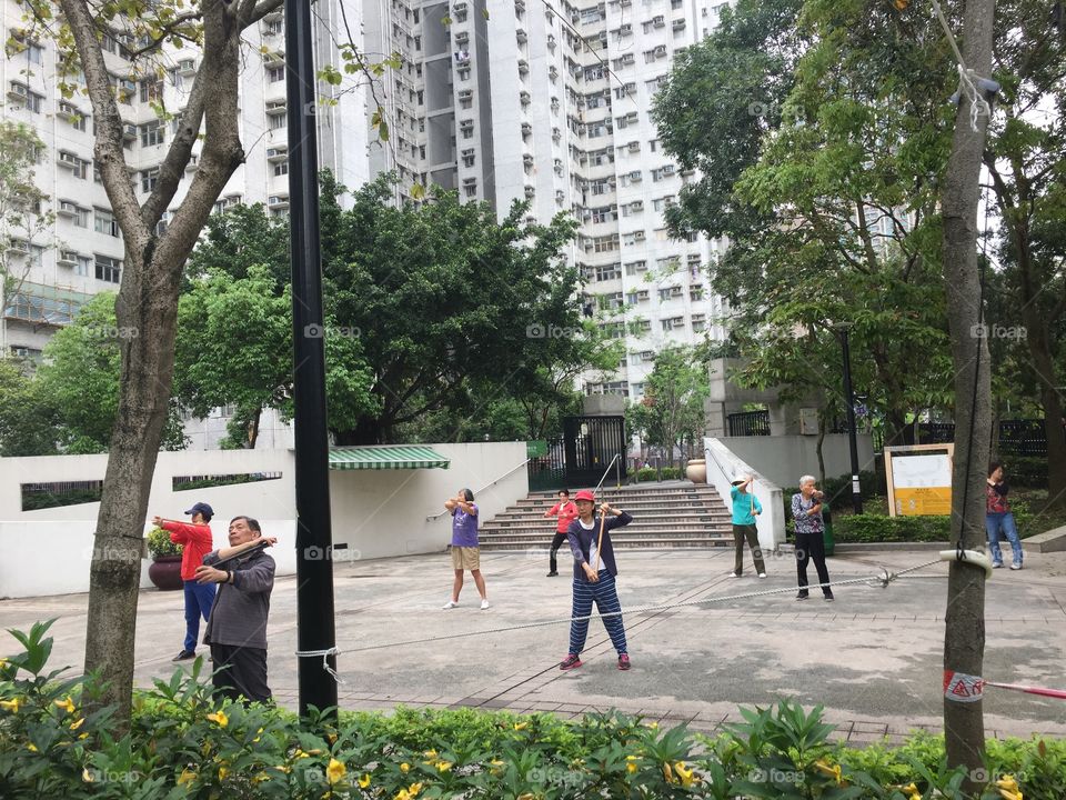 Hong Kong, Mongkok- Cherry Street Park Yoga and Tai Chi with Bamboo Sticks