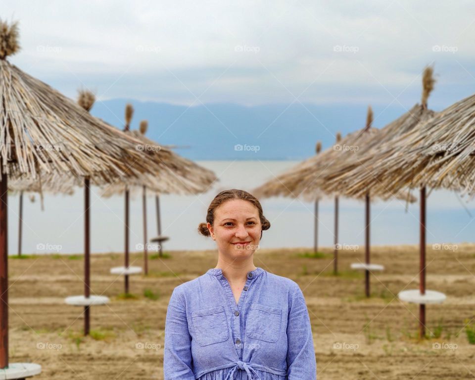 Natural woman portrait on the beach