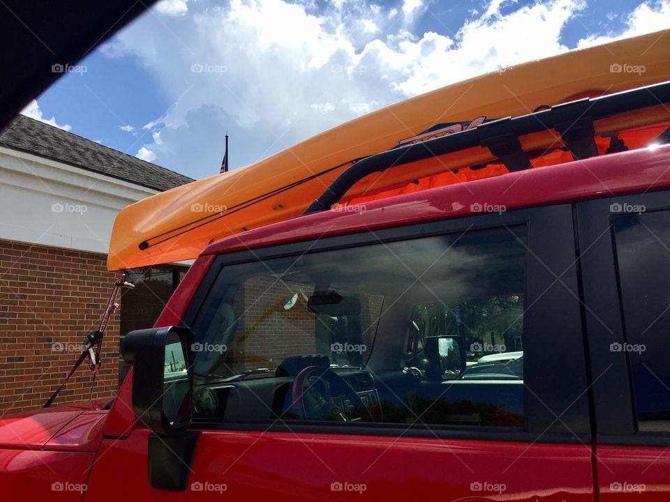 Red keep with yellow canoe or kayak 