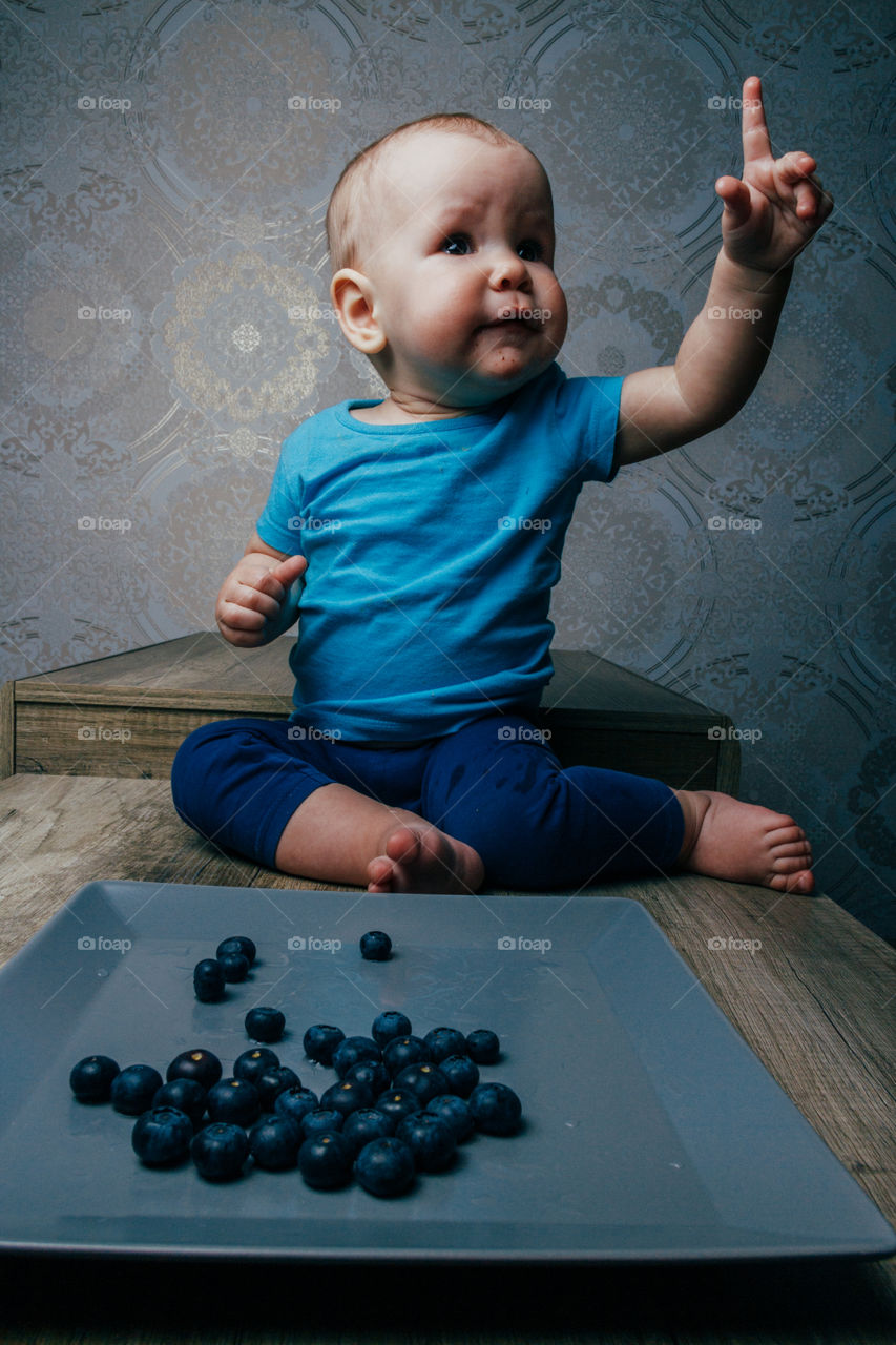 Baby eating the blueberries. More please