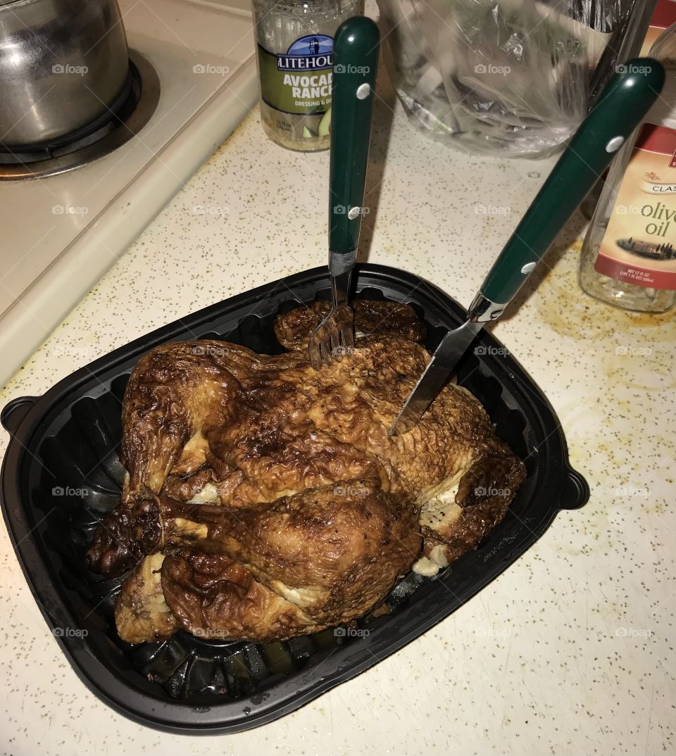 Double stabbed before being carved like a Thanksgiving turkey. Sticking them to this chicken is a humorous concept if you think about it.