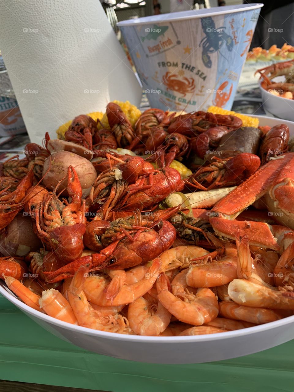 I took it with my phone - Feeding a crowd on my birthday with a Cajun-style crawfish boil, including shrimp and snow crab which was prepared outside over propane heat