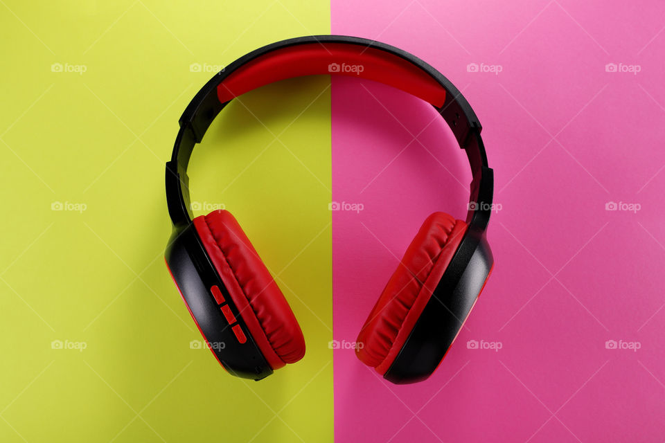 Bluetooth wireless headphones on colorful background