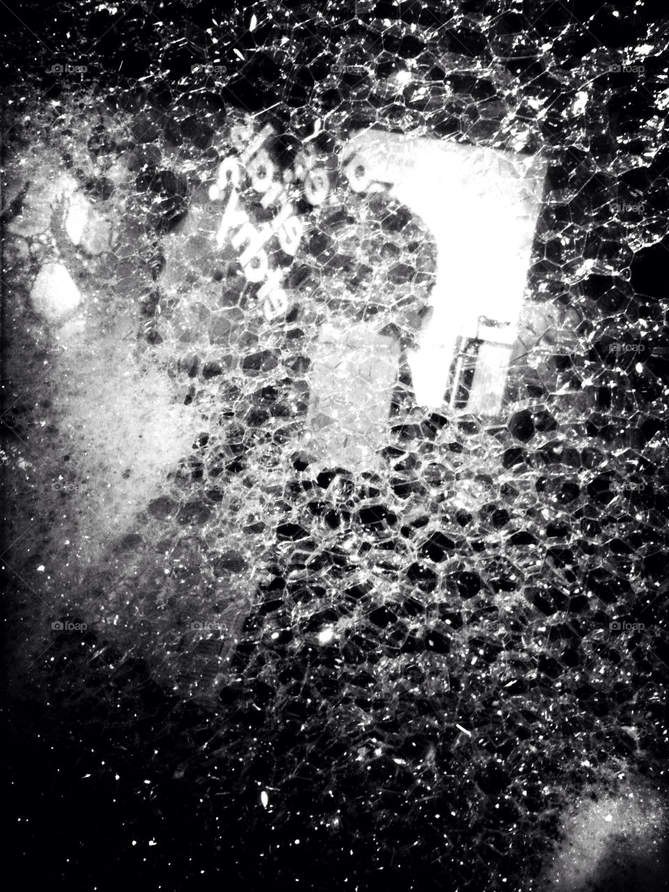 Boys reflection in the bubble experiment at the science musuem.