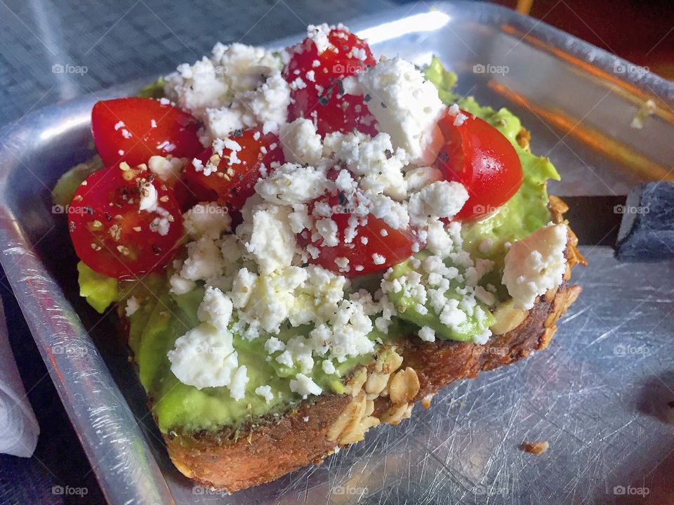 Avocado toast with feta and tomato 