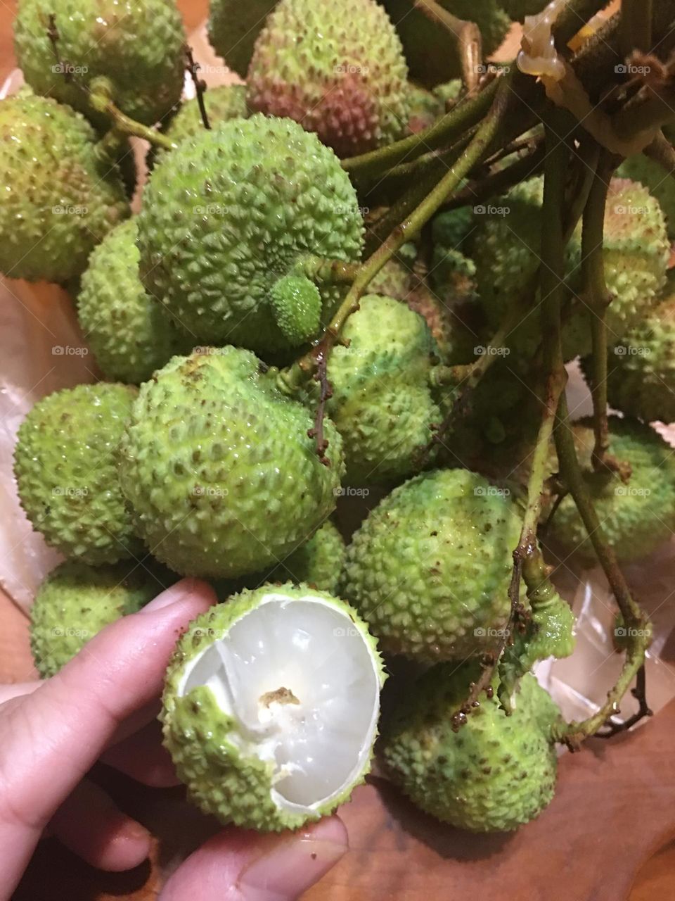 litchi, green but sweet 