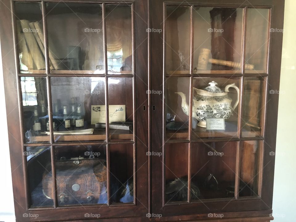 Cabinet with old stuff in it