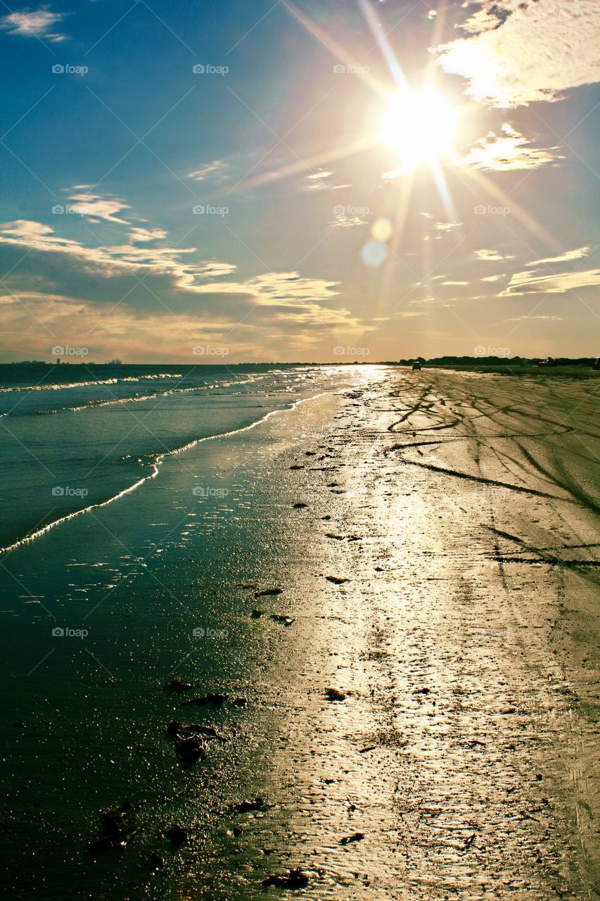 sunbeam over the sea