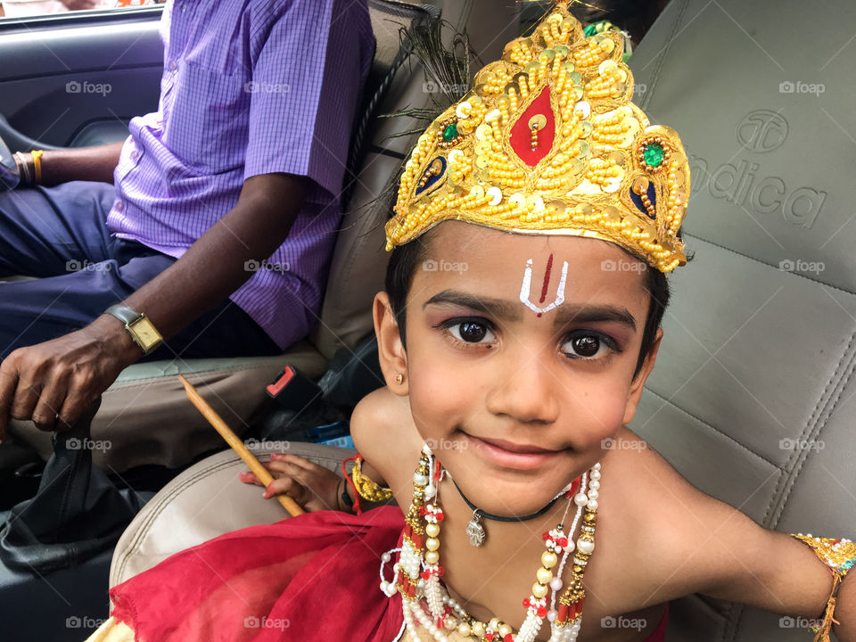 Cute baby dressed with jewellery 