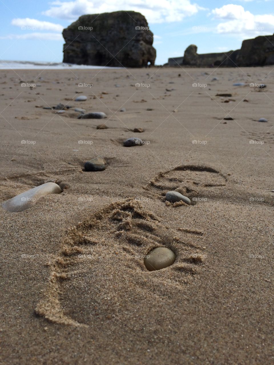 Footprint In The Sand. Close up of a footprint in the sand ...