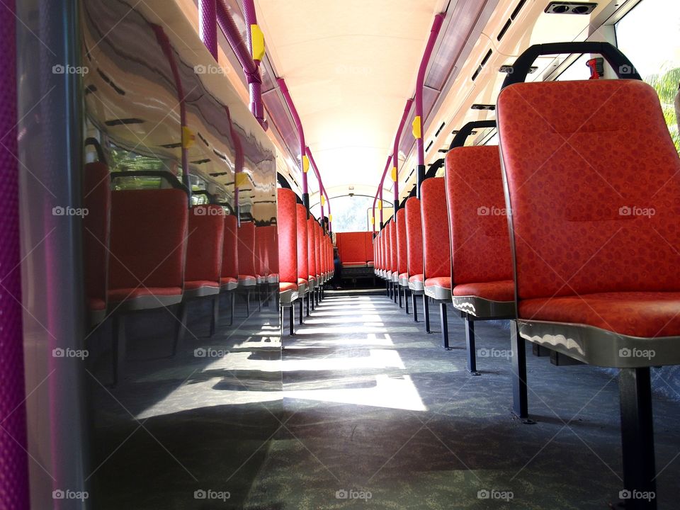 empty seats inside a bus